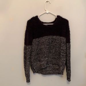 South moon under fuzzy sweater